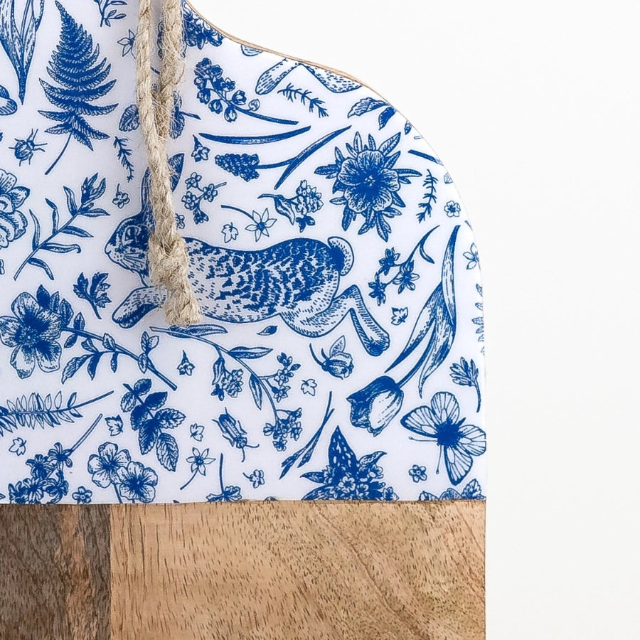 50cm mango wood serving board showing close up of the blue hare and flora print enamel inlay | Mellowdays Furniture