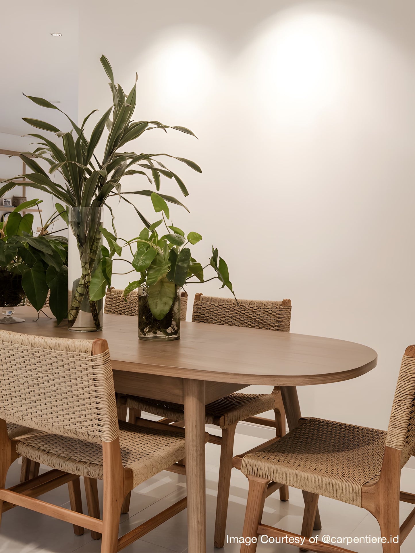 Dining room featuring Asturia wooden dining chairs with woven seats in natural peanut mind wood | Mellowdays Furniture