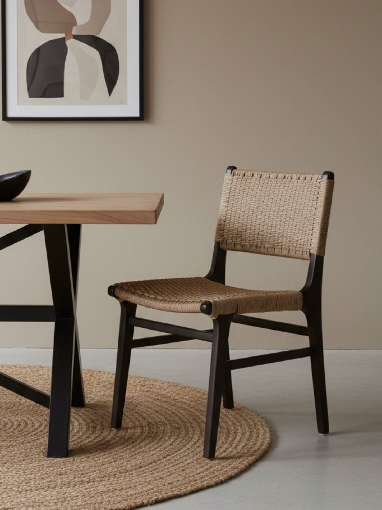 Asturia woven wooden dining chair with handwoven back and seat in mindi wood with black finish | Mellowdays Furniture