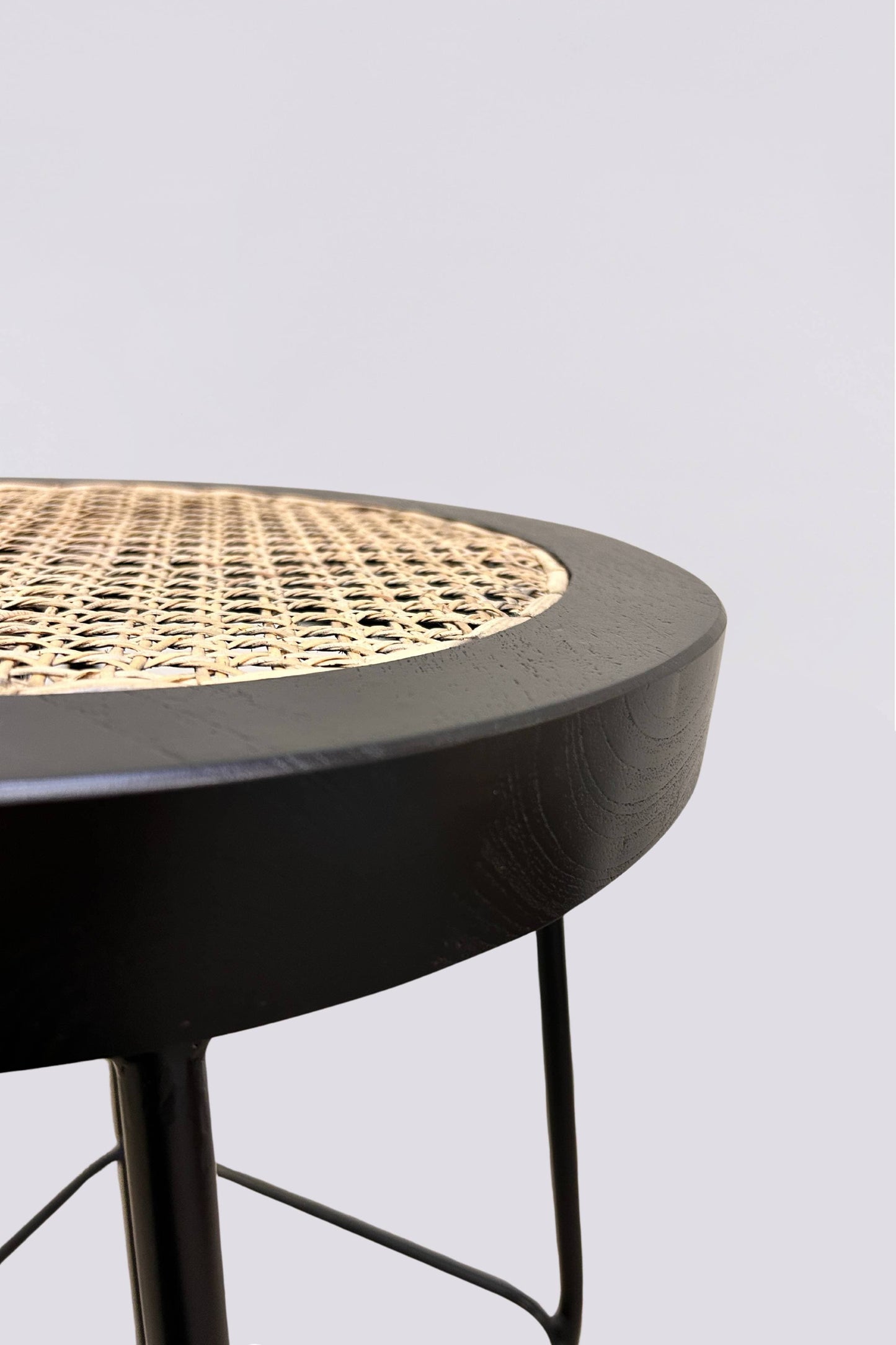 Bakanda set of 2 black colour teakwood and rattan 65cm counter stools close up by Mellowdays Furniture