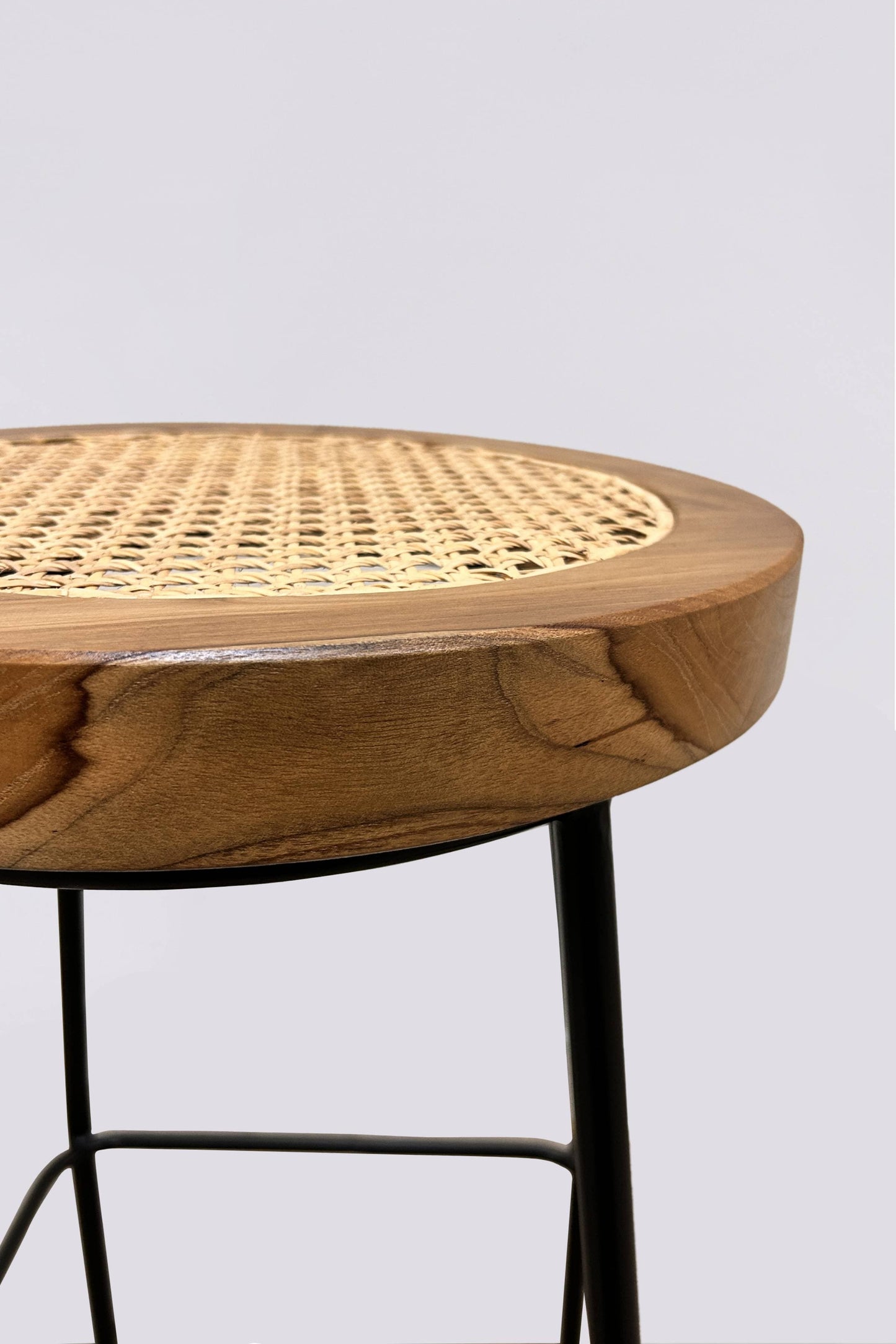 Bakanda set of 2 natural colour teakwood and rattan 65cm counter stools close up by Mellowdays Furniture