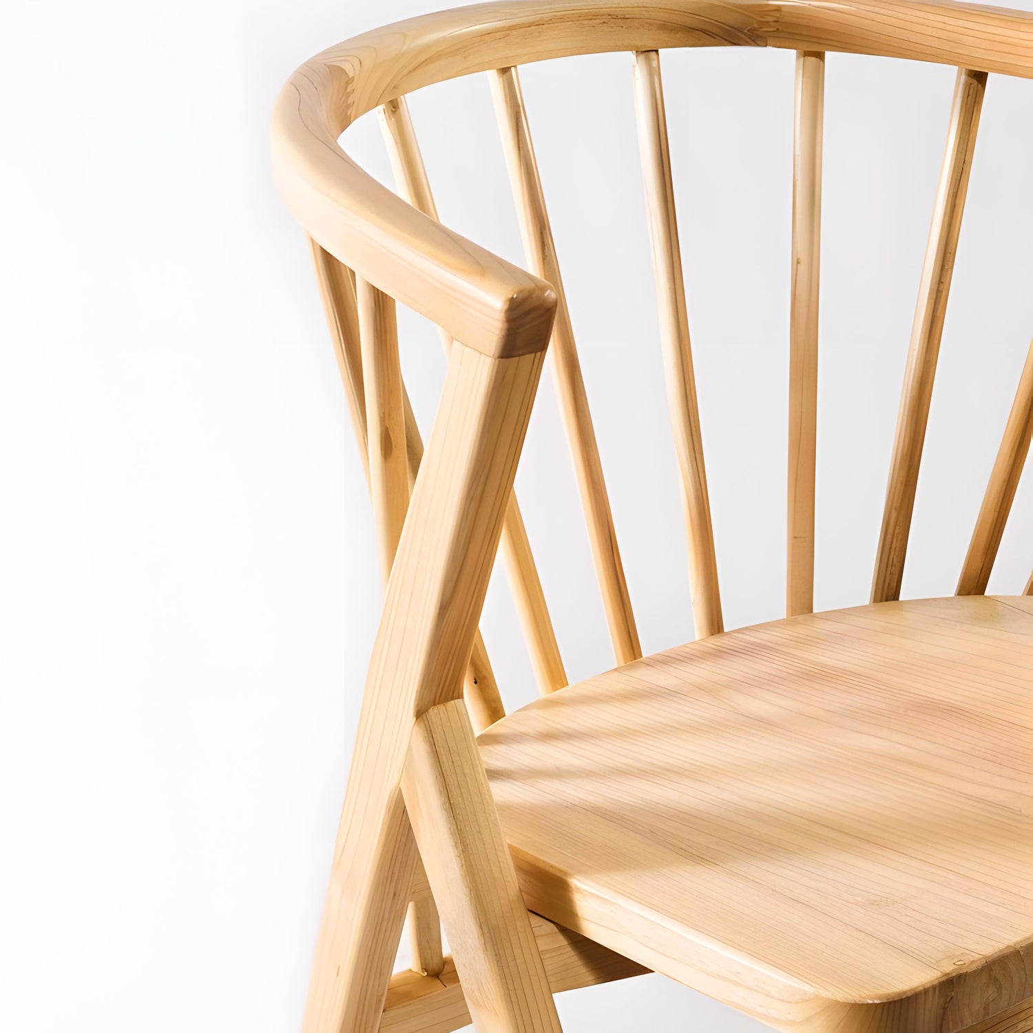 Expertly handcrafted from Sungkai wood, the Falconi Dining Chair showcases natural warmth and durability.