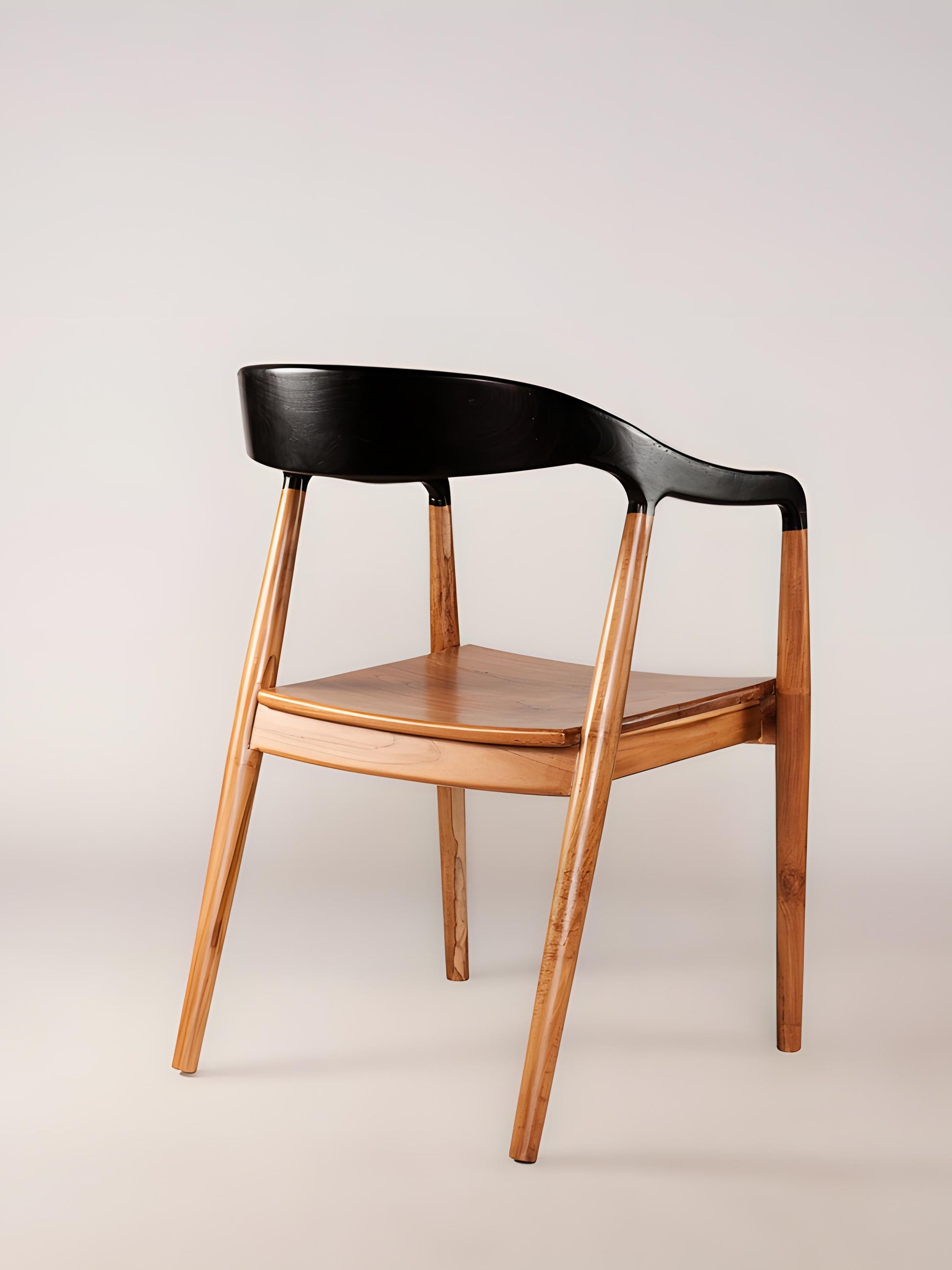 Back of Jacobo teak wood dining chair with curved back and armrests in dark choco finish | Mellowdays Furniture