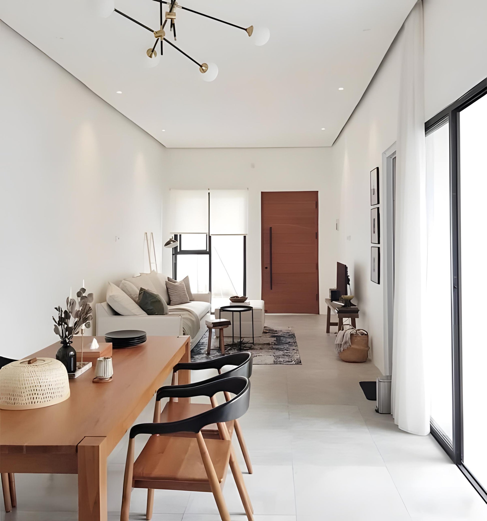 Jacobo teak wood dining chair with curved back and armrests in dark choco finish in dining room | Mellowdays Furniture