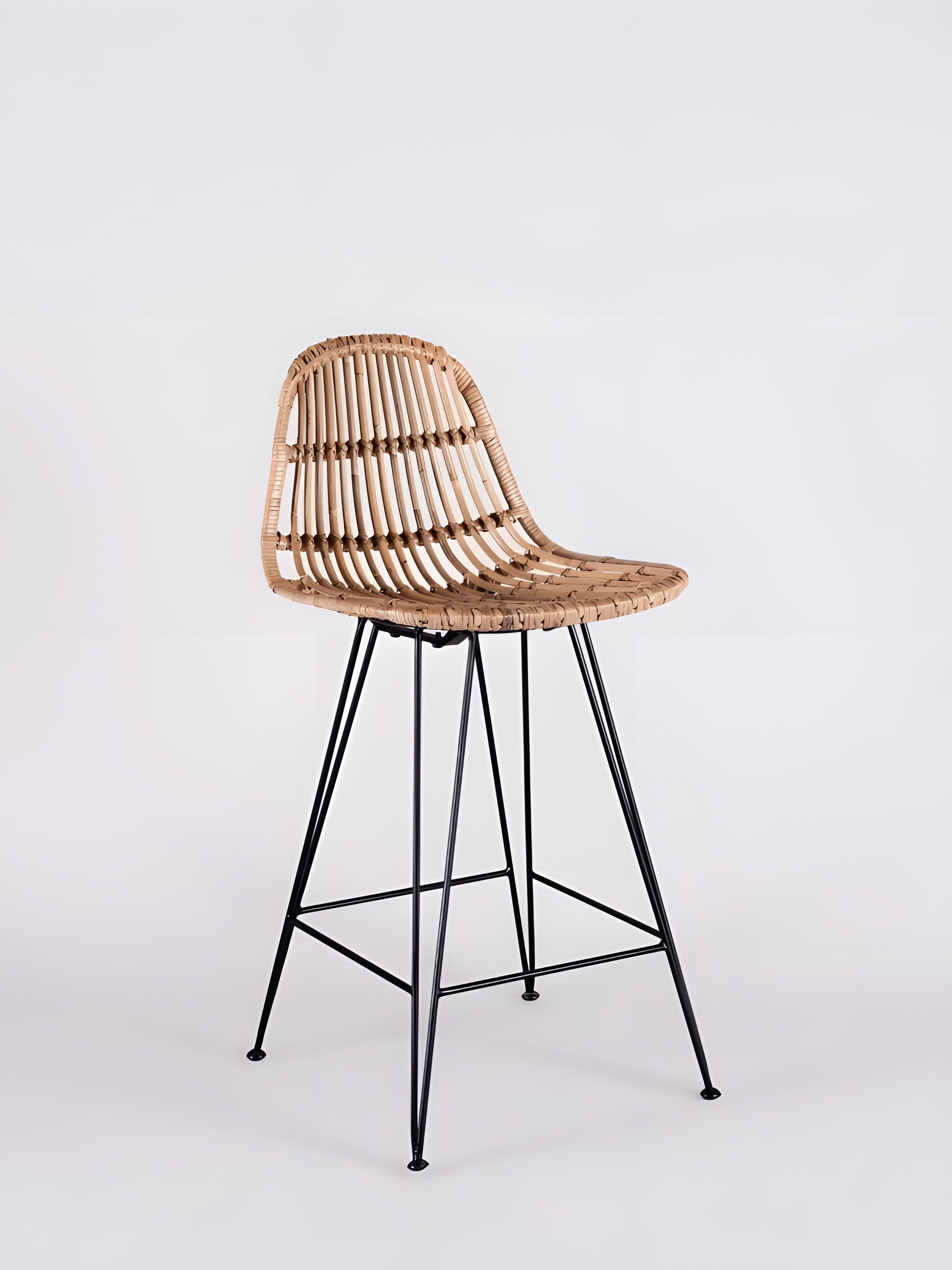 Julio Rattan Kitchen Stool with black metal legs front view by Mellowdays Furniture