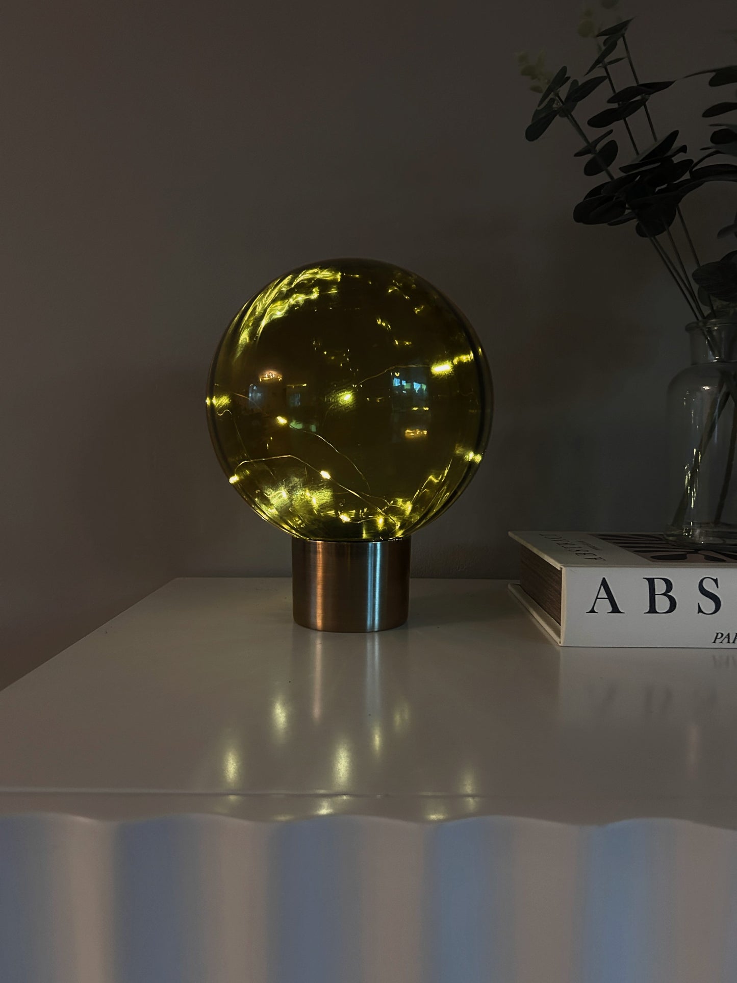 24cm olive green LED Ball table lamp with led light string on a brushed brass metal base | Mellowdays Furniture