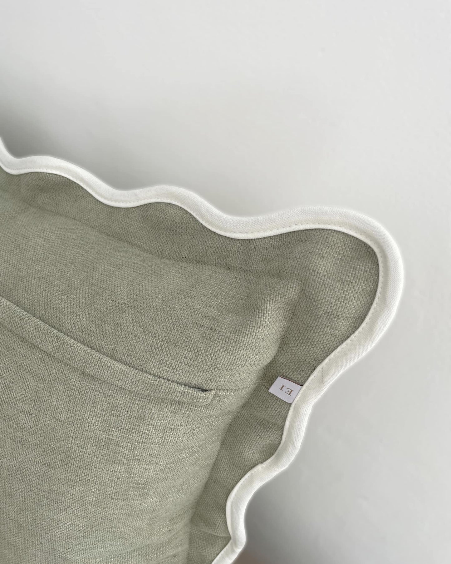 Sage Scalloped Edge Decorative Cushion Cover 45x45cm showing zip entry | Mellowdays Furniture