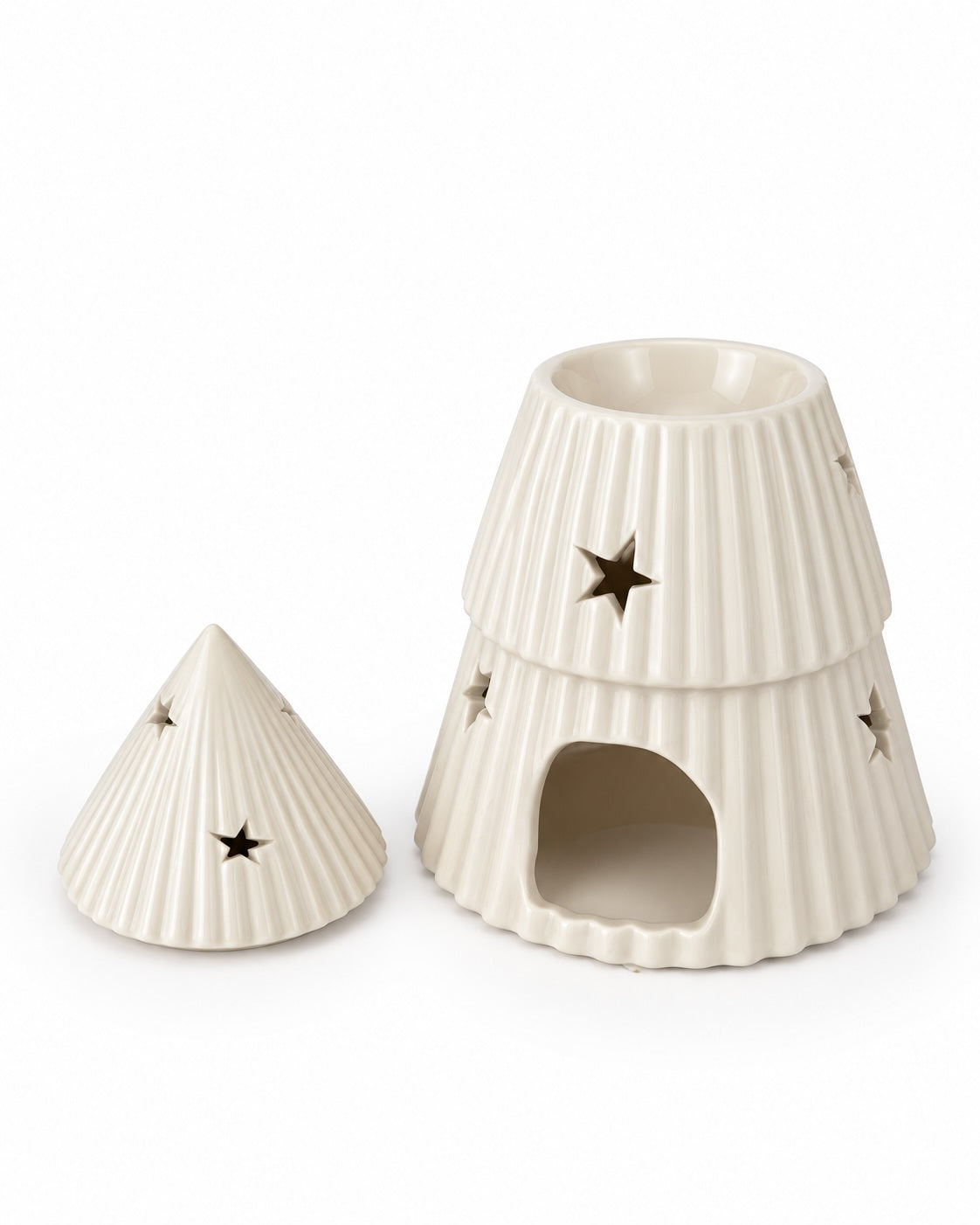 An off-white ceramic Christmas Tree Oil Burner / Wax Warmer with a matching lid, featuring a ribbed texture and star-shaped cutouts