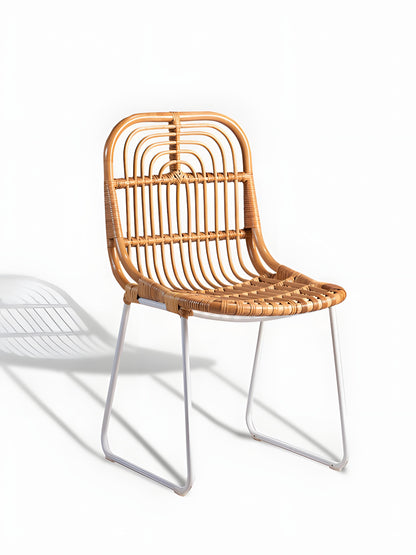 Aitor Rattan Dining Chairs with white metal legs - front view - Mellowdays Furniture