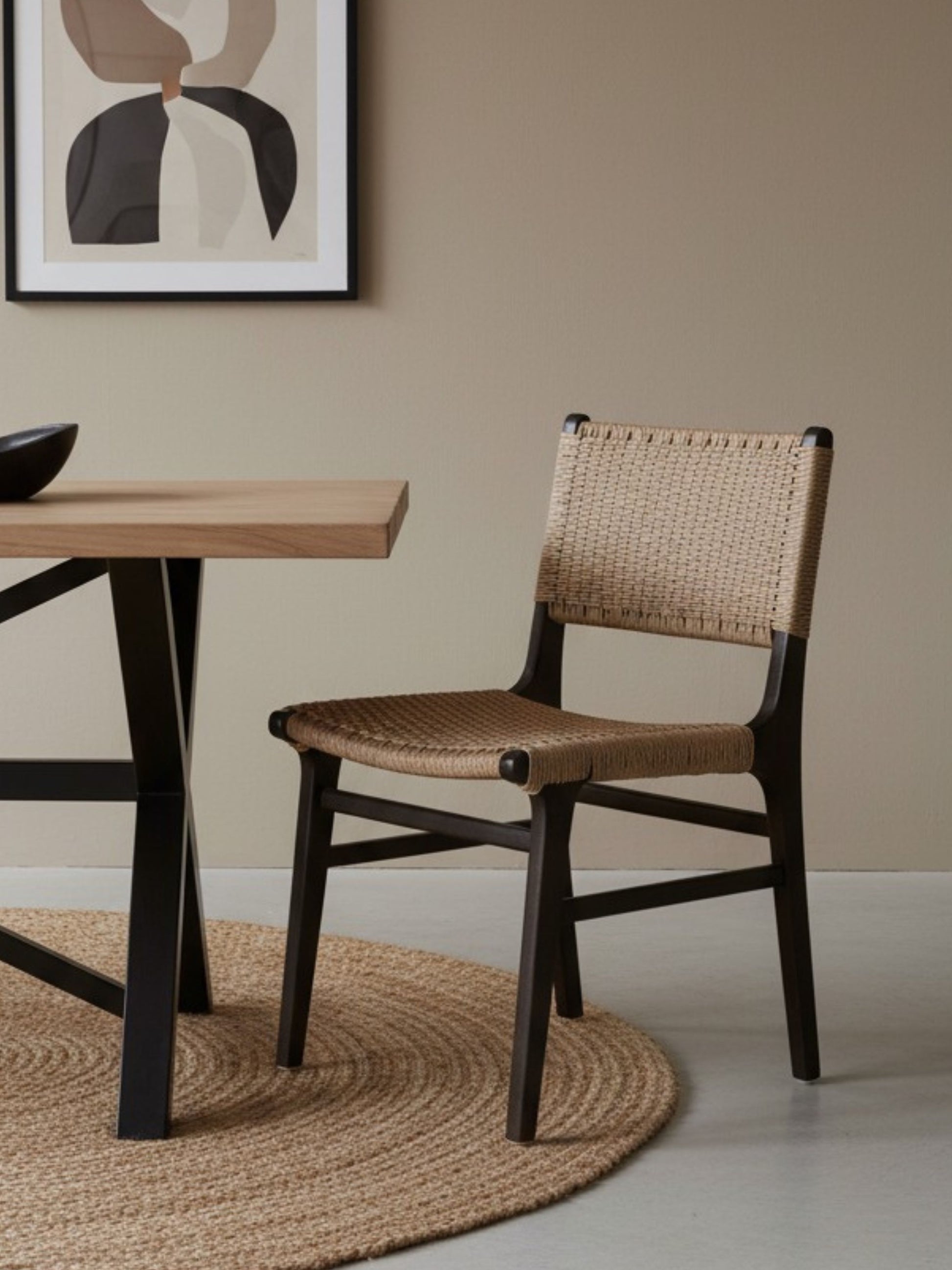 Asturia woven wooden dining chair with handwoven back and seat in mindi wood with black finish | Mellowdays Furniture