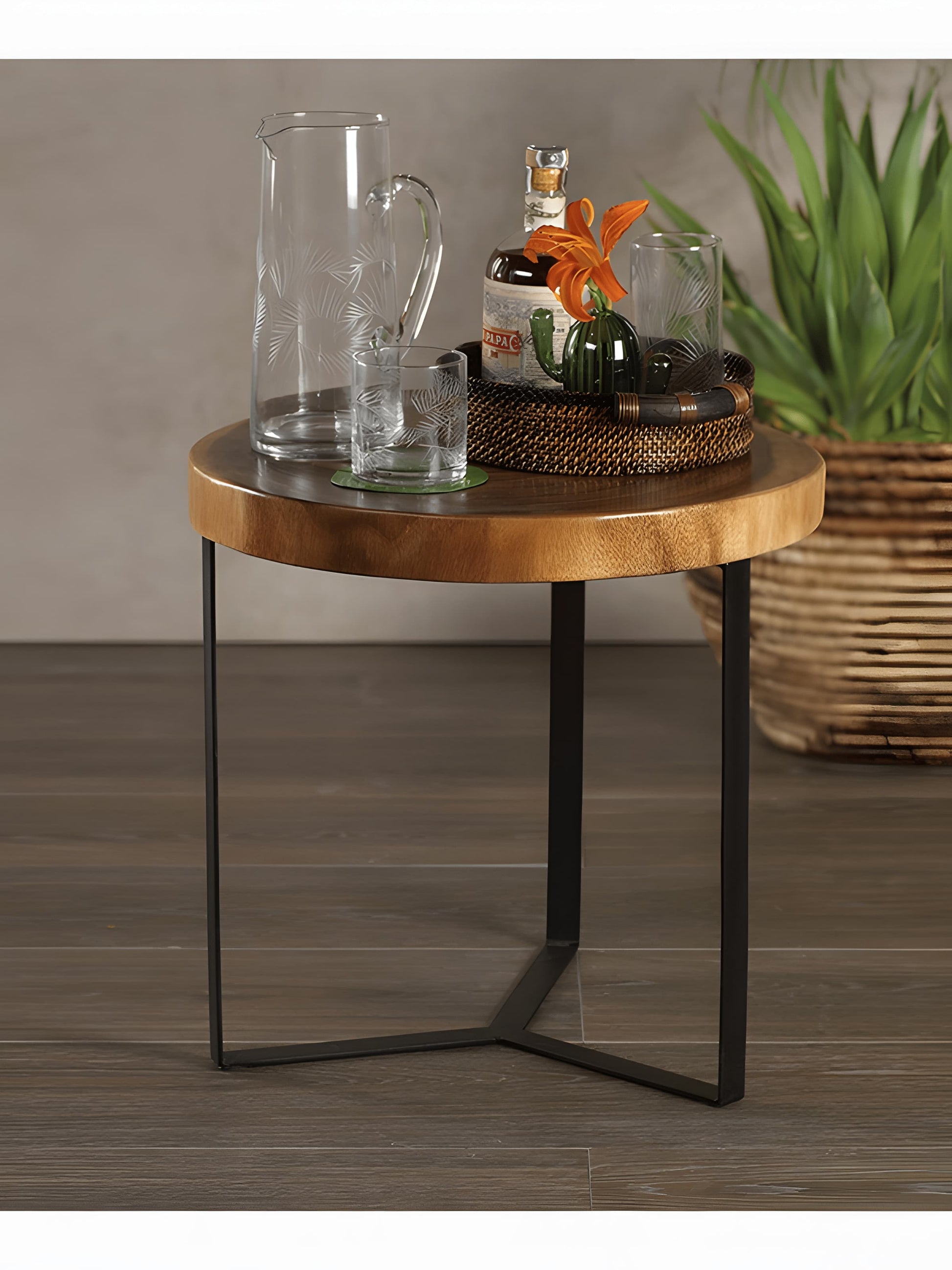 Cartagena Set of Two Suar Wood Top Coffee Tables with black metal legs front view with glass jar and decorations by Mellowdays Furniture