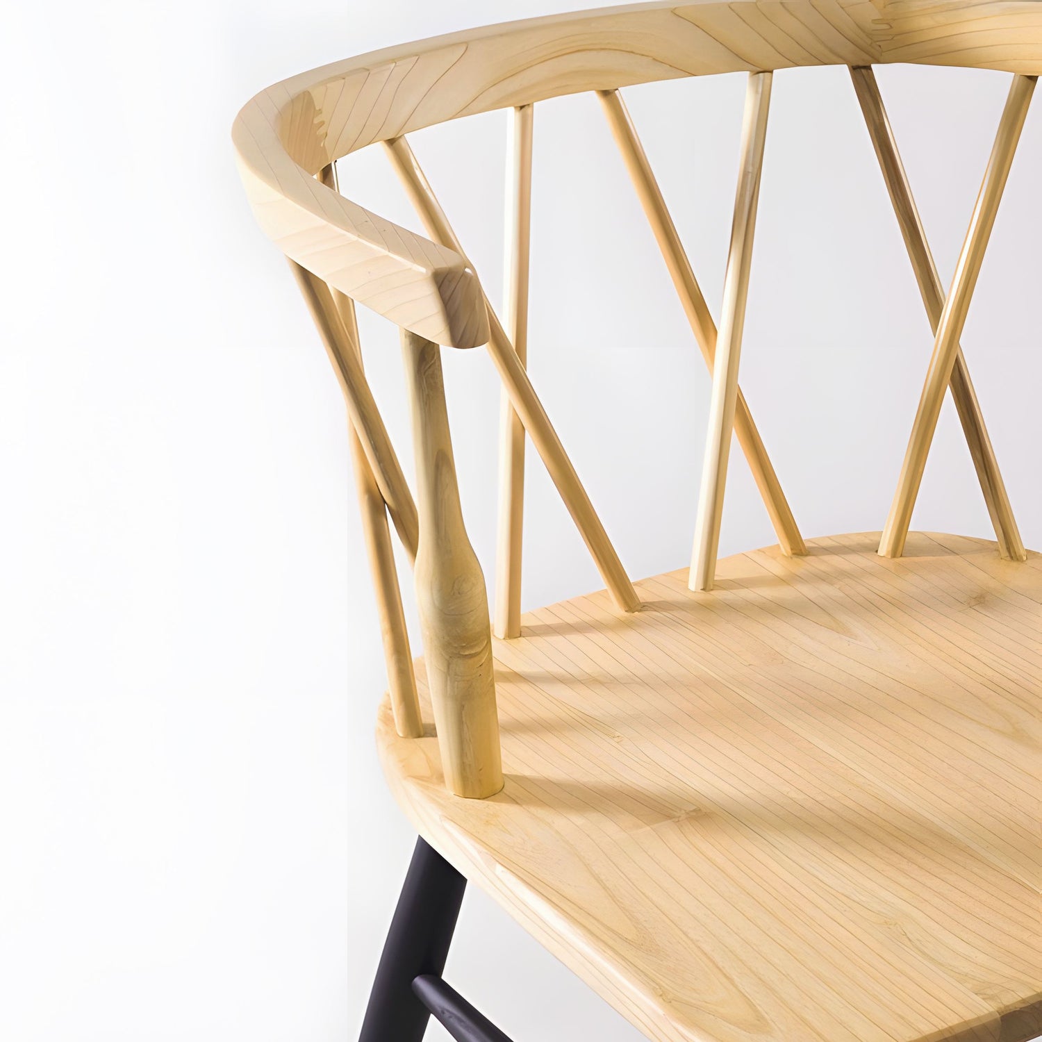 Crafted from high-quality Sungkai wood, the Fallas Dining Chair offers both durability and visual appeal. 