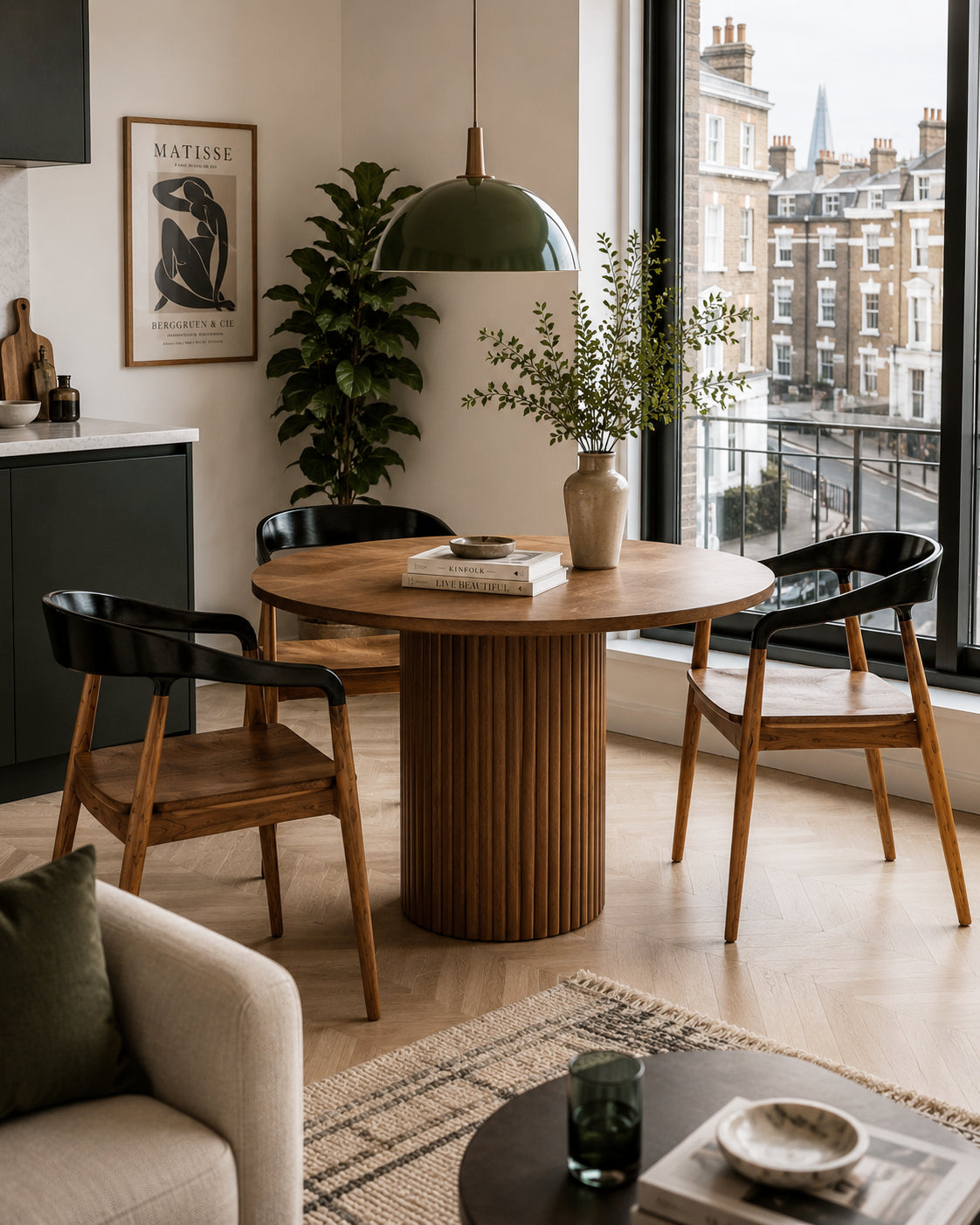 Jacobo teakwood dining chair in sunlit scandinavian dining corner | Mellowdays Furniture