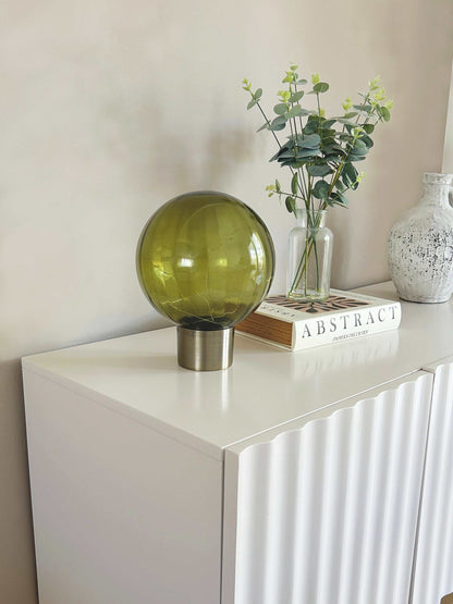 24cm olive green LED Ball table lamp with led light string on a brushed brass metal base | Mellowdays Furniture