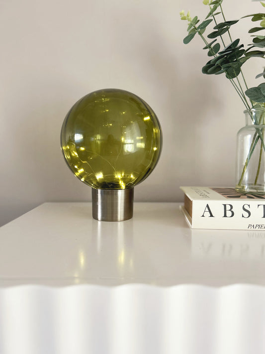 24cm olive green LED Ball table lamp with led light string on a brushed brass metal base | Mellowdays Furniture