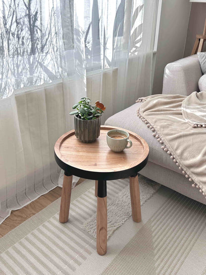 Tomasa Teakwood Round Tray Side Table in living room - Natural Teakwood with Black Accent Finish - Mellowdays Furniture