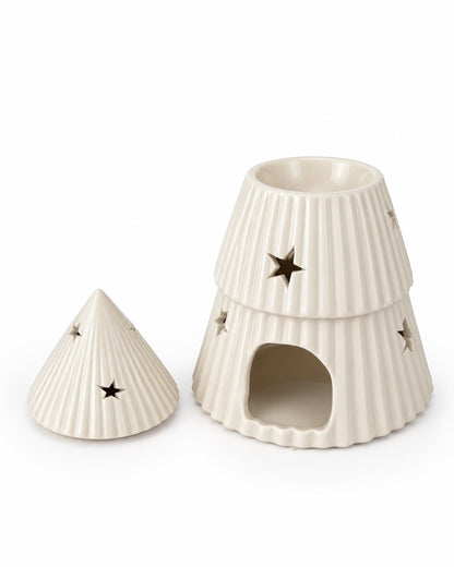 An off-white ceramic Christmas Tree Oil Burner / Wax Warmer with a matching lid, featuring a ribbed texture and star-shaped cutouts